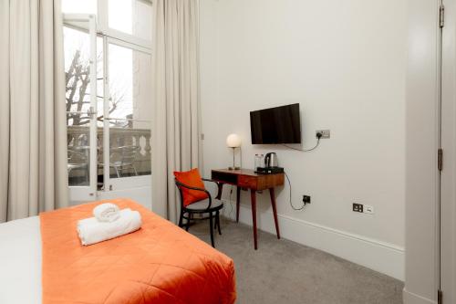 Habitación Doble Deluxe del hotel Kensington House. Foto 3