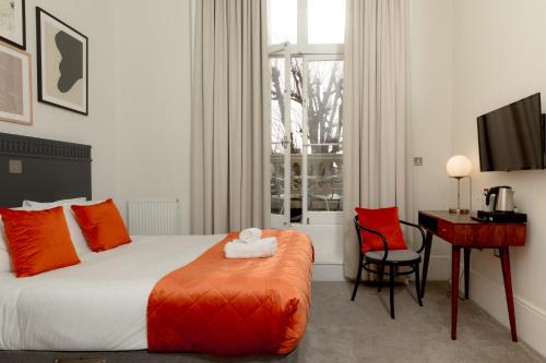 Habitación Doble Deluxe del hotel Kensington House. Foto 7