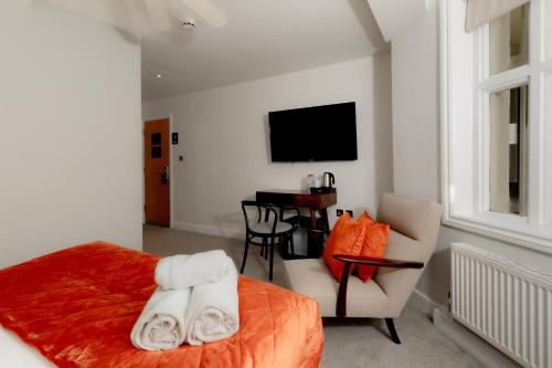 Habitación Doble Estándar del hotel Kensington House. Foto 3