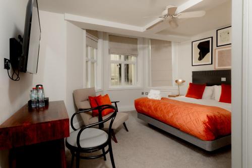 Habitación Doble Estándar del hotel Kensington House. Foto 5