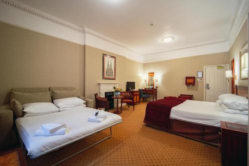 Habitación Triple del hotel Grange Clarendon. Foto 3