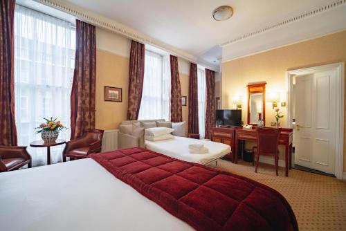 Habitación Triple del hotel Grange Clarendon. Foto 8