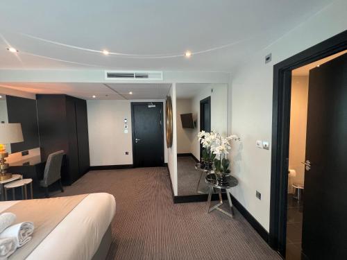 Suite Junior con balcón del hotel Hatton Garden. Foto 7