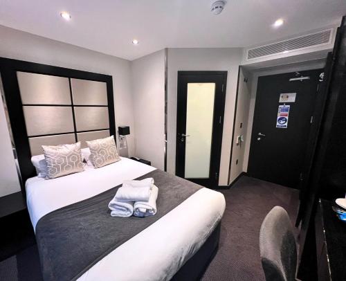 Habitación Doble Económica del hotel Great St Helen. Foto 1