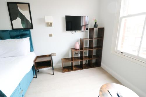 Estudio del hotel High Street Kensington by Viridian Apartments. Foto 26