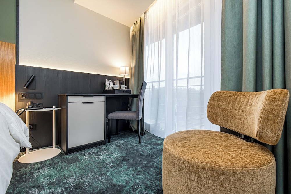 Habitación Clásica con 2 camas zip (dobles o individuales) del hotel Mercure Palanga Vanagupe Resort. Foto 6