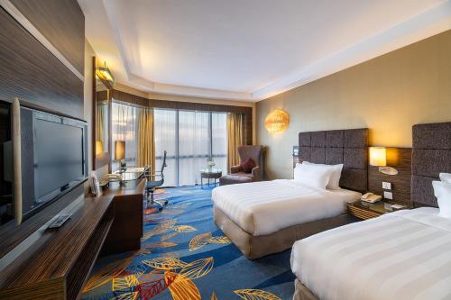 Habitación Doble Premier - 2 camas del hotel Beijing Peace