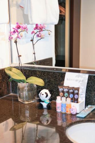 Deluxe King with Sofa Bed del hotel Beijing Peace. Foto 2