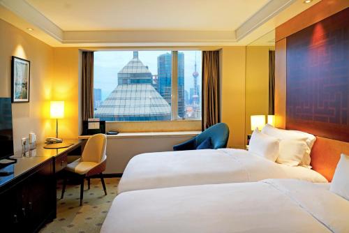 Habitación Doble Executive Collection - 2 camas del hotel Radisson Collection Hyland Shanghai. Foto 2