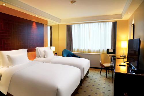 Habitación Doble Superior Collection - 2 camas del hotel Radisson Collection Hyland Shanghai. Foto 1