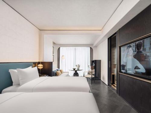 HABITACIÓN CLUB DE LUJO, Acceso Club Millesime, 2 Camas Individuales, Vistas a la Ciudad del hotel Sofitel Shanghai North Bund. Foto 1