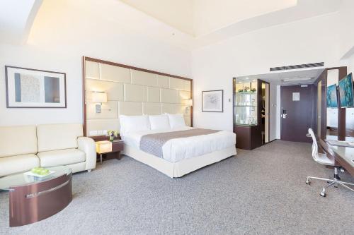 Habitación Doble Premier - cama grande o 2 camas del hotel Regal Airport. Foto 3
