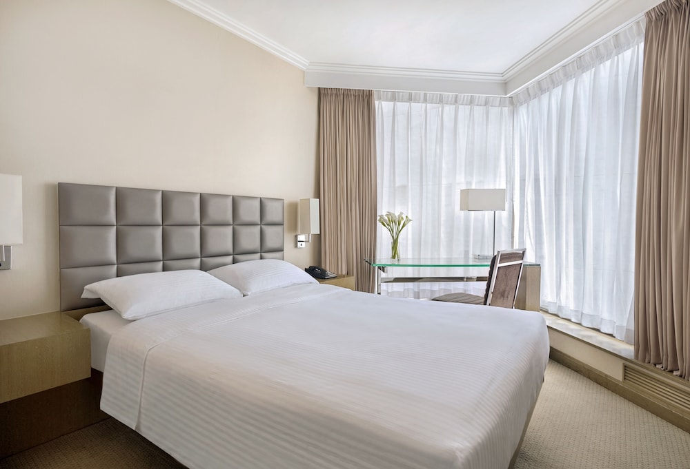 Habitación Deluxe del hotel The Kowloon. Foto 4