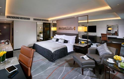 Habitación Premium con cama extragrande y vistas a la ciudad del hotel Intercontinental Grand Stanford Hong Kong, An Ihg