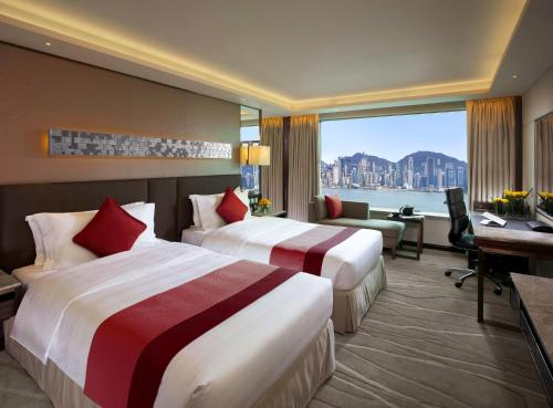 Habitación Doble Clásica con vistas al puerto Victoria - 2 camas del hotel Intercontinental Grand Stanford Hong Kong, An Ihg. Foto 4