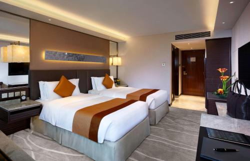 Habitación Doble Clásica con vistas a la ciudad - 2 camas del hotel Intercontinental Grand Stanford Hong Kong, An Ihg. Foto 4