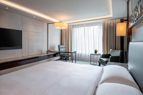 Habitación Clásica con cama extragrande del hotel Intercontinental Grand Stanford Hong Kong, An Ihg. Foto 1