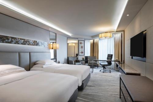 Habitación Doble Clásica - 2 camas del hotel Intercontinental Grand Stanford Hong Kong, An Ihg. Foto 2