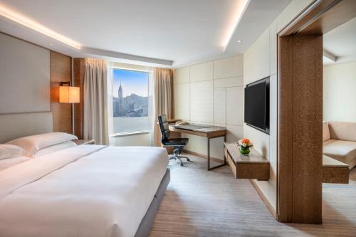 Suite con 1 dormitorio y vistas al perfil urbano del puerto del hotel Intercontinental Grand Stanford Hong Kong, An Ihg. Foto 4