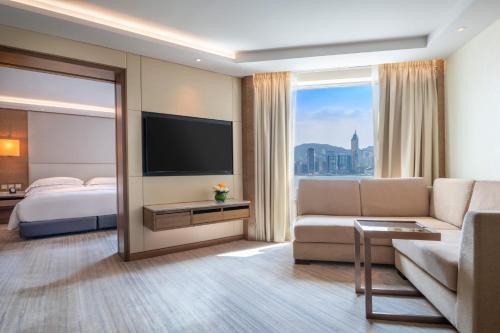 Suite con 1 dormitorio y vistas al perfil urbano del puerto del hotel Intercontinental Grand Stanford Hong Kong, An Ihg. Foto 5