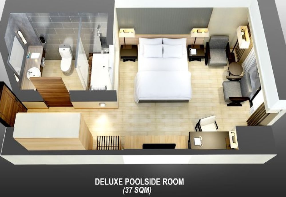 HABITACIÓN DELUXE JUNTO A LA PISCINA 1 CAMA KING del hotel Grand Mercure Singapore Roxy. Foto 2