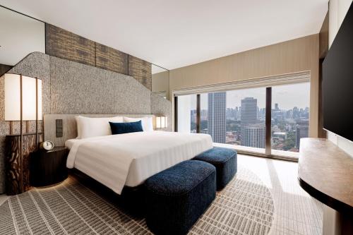 Suite Skyline con vistas a la ciudad y acceso al salón - Planta alta del hotel Pan Pacific Singapore. Foto 4