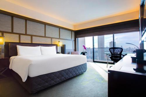 2 habitaciones comunicadas Deluxe Panorámica con vistas a la ciudad - Planta alta del hotel Pan Pacific Singapore