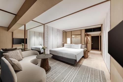 Alojamiento Marina Bay Executive con cama extragrande y vistas a Marina Bay - Planta superior del hotel Pan Pacific Singapore. Foto 4