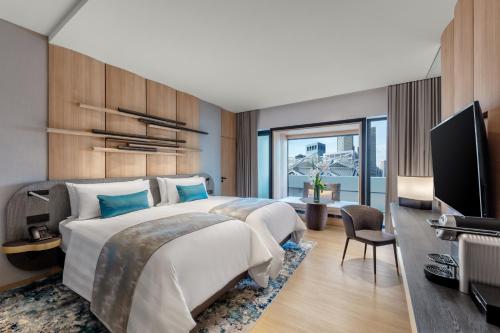Habitación Premier Lifestyle - 1 cama extragrande del hotel Parkroyal Collection Marina Bay, Singapore. Foto 5