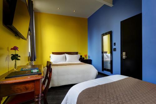 Habitación Triple Estándar del hotel Sohotel. Foto 1