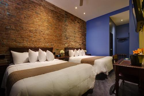 Habitación Deluxe con 2 camas grandes del hotel Sohotel. Foto 4