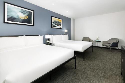 Deluxe con 2 camas grandes del hotel OYO Times Square. Foto 1