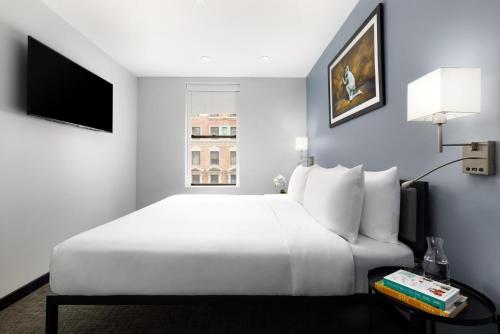 Habitación con Cama completa del hotel OYO Times Square