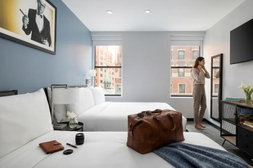Deluxe con 2 camas grandes del hotel OYO Times Square. Foto 6