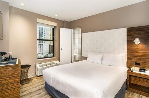 Habitación Deluxe Queen del hotel The Gallivant Times Square. Foto 1