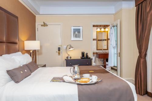 Habitación Deluxe del hotel Fitzpatrick Manhattan. Foto 1