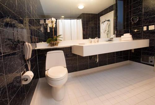 Habitación Deluxe del hotel Fitzpatrick Grand Central. Foto 2