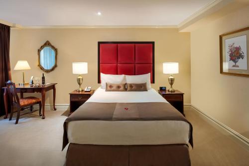 Habitación Deluxe del hotel Fitzpatrick Grand Central. Foto 4