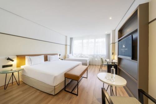 Habitación Triple del hotel Eurostars Acteón. Foto 1