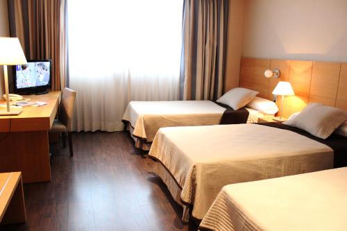 Habitación Triple Estándar del hotel Eurohotel Castellón. Foto 1