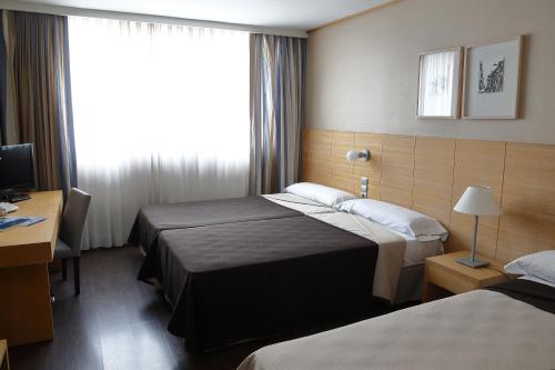 Habitación Triple Estándar del hotel Eurohotel Castellón. Foto 3