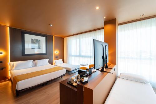 Habitación Triple del hotel Abba Playa Gijón. Foto 3