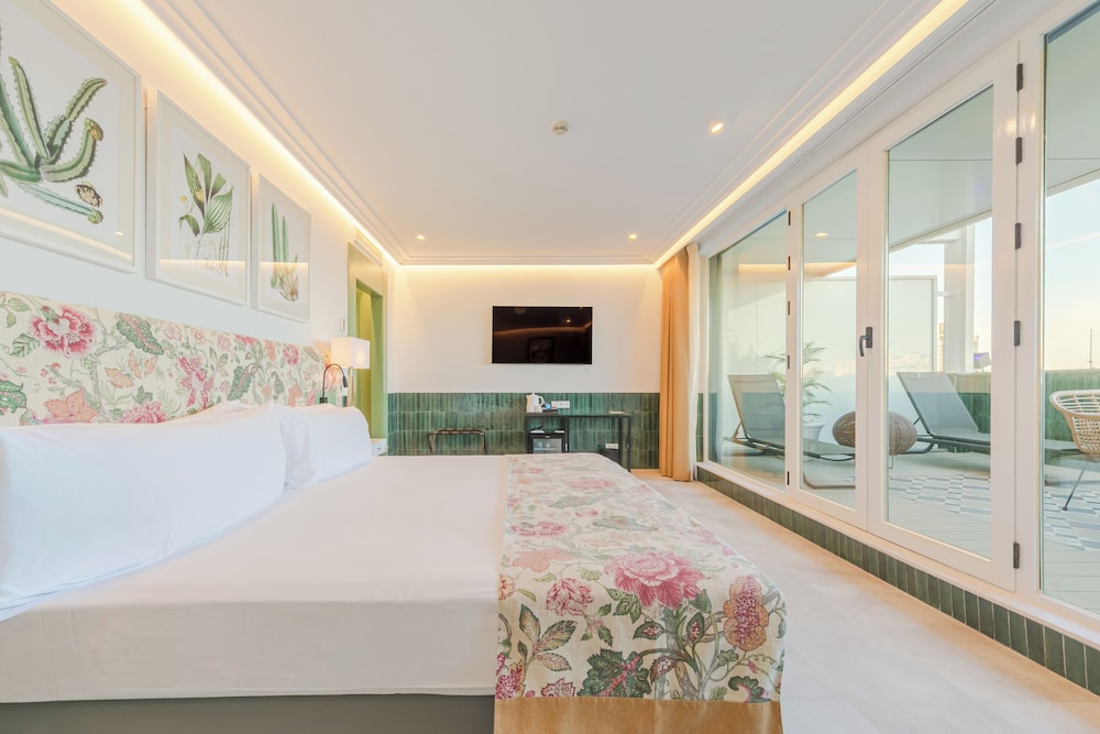 Habitación superior, terraza, vistas a la ciudad del hotel Ribera De Triana