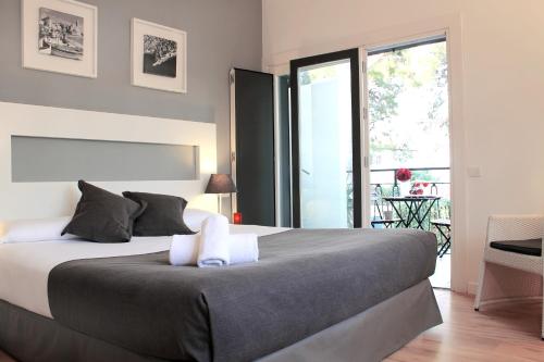 Habitación Doble con balcón - 1 o 2 camas del hotel Sitges. Foto 1