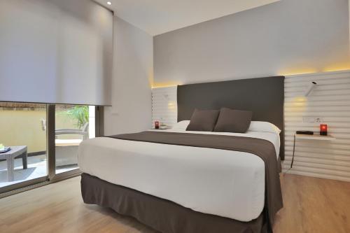Habitación Doble Estándar con jardín - 1 o 2 camas del hotel Sitges