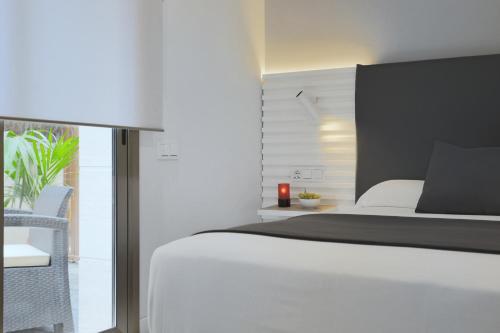 Habitación Doble Estándar con jardín - 1 o 2 camas del hotel Sitges. Foto 2