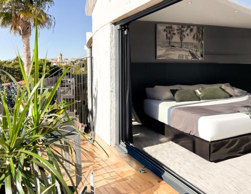 Habitación Doble Deluxe con bañera del hotel Sitges. Foto 1