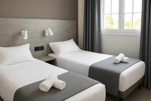 Habitación Familiar con balcón del hotel Sitges