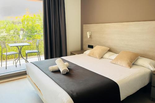 Habitación Familiar con balcón del hotel Sitges. Foto 3