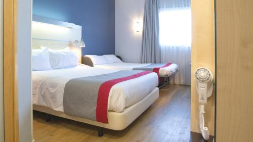 Habitación Doble Estándar con sofá cama del hotel Holiday Inn Express Valencia - Bonaire, An Ihg. Foto 5